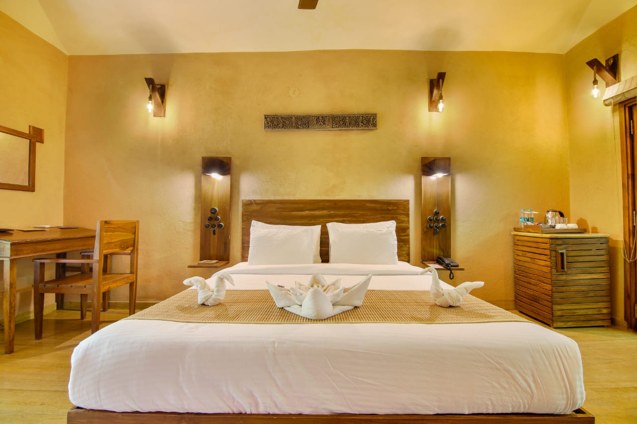 Cottage bedroom with warm lamplight